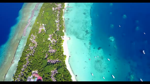 Aerial view travel of tropical shore beach break by aqua blue lagoon with white sand background of a