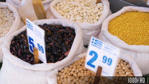 Different Bean Types in Sacks For Sale in a Farmers Market