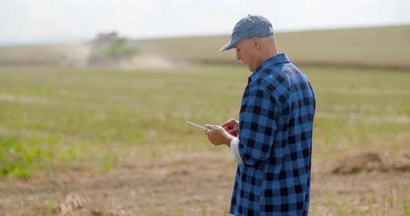 Farmer Using Digital Tablet Agriculture