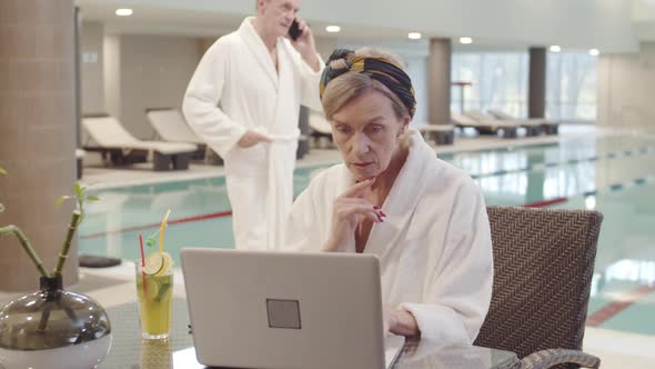 Business People Working in Swimming Pool