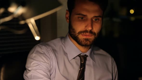 Businessman writing on whiteboard