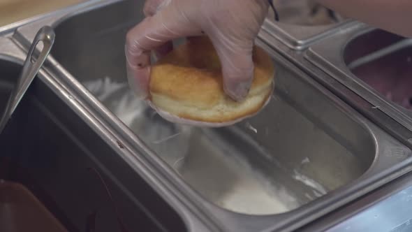 The Chef Is Putting a Donut in the Milky Glaze