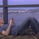 Stranded Airplane Traveler Laying on Floor - VideoHive Item for Sale