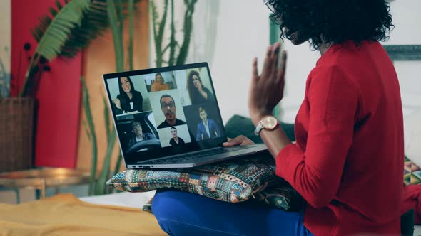 Internet Conference with an African Woman Taking Part in It. Videoconference Meeting, Remote Work