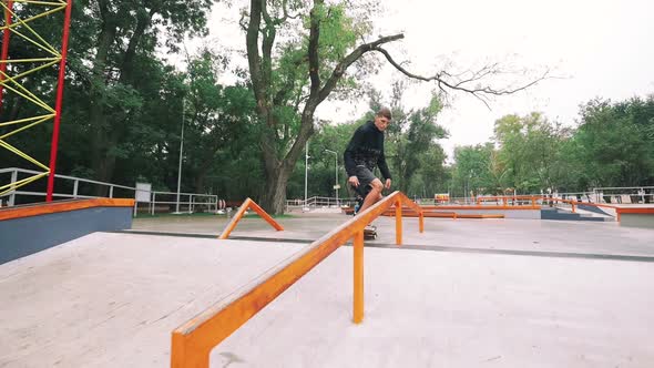 Two Skateboarders in Skate Park Doing Tricks Slow Motion