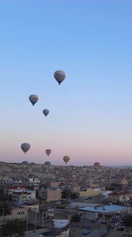 Vertical Video of Hot Air Balloons Flying in the Sky Over Cappadocia Turkey