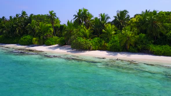 Aerial drone sky of coast beach by blue water and sand background