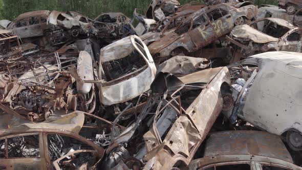 War in Ukraine a Dump of Burned Cars in Irpin Bucha District