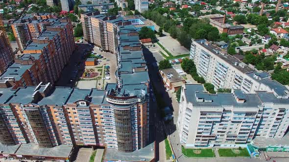 House building and city construction. Aerial view of architectural complex of residential buildings