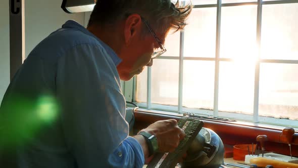 Craftswoman working in workshop