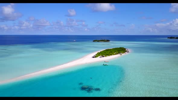 Aerial drone nature of idyllic shore beach voyage by blue water with white sand background of a dayo