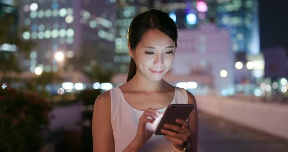 Woman Use of Mobile Phone for Online