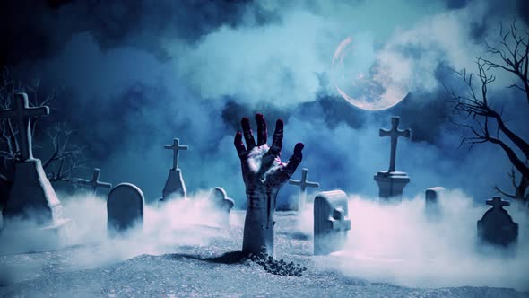 Zombie Hand Rising Out Of A Graveyard