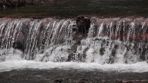 Beautiful Rapids on Mountains River and Small Waterfall. Slow Motion