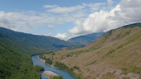 Blue Katun river in the middle of mountains of Ak-Kem valley in Altai