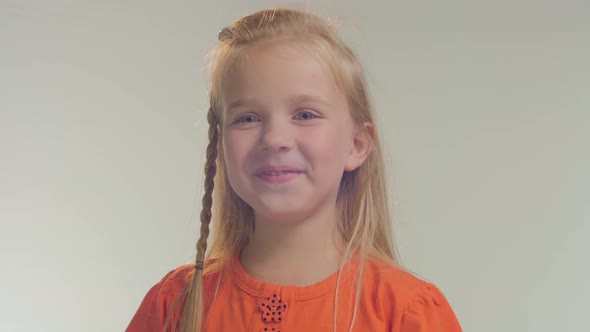 Close up of a little girl laughing