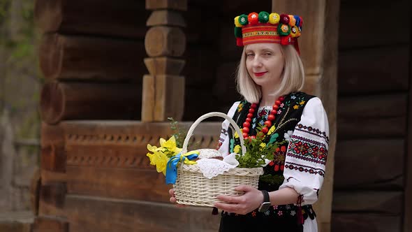 Ukrainian Woman in Traditional Ukrainian National Costume with Easter Basket