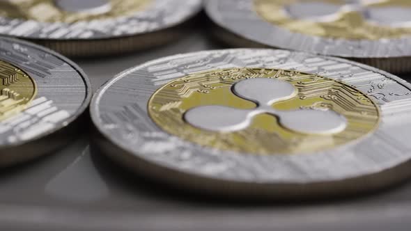 Rotating shot of Ripple Bitcoins (digital cryptocurrency) - BITCOIN RIPPLE 0020