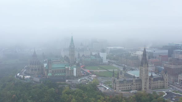 Aerial view of Canadian parliament through thick fog