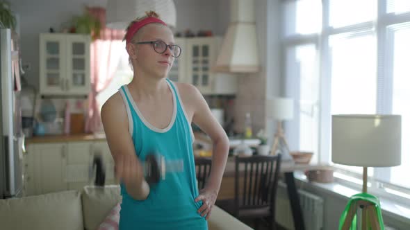 Cute Funny Young Gay Man Wearing Glasses And Bright Sportswear