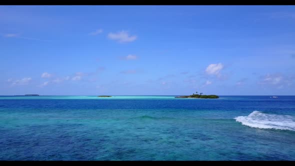 Aerial drone sky of perfect lagoon beach holiday by clear lagoon and white sandy background of a day