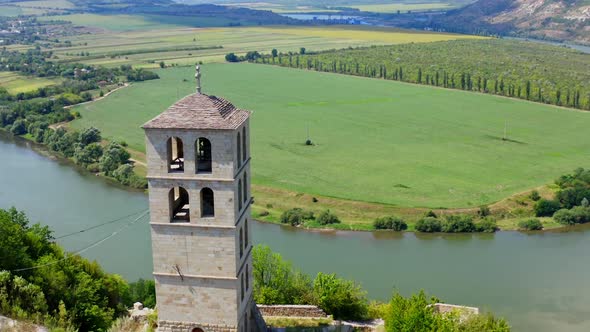 Aerial view of monastery on high steep rock