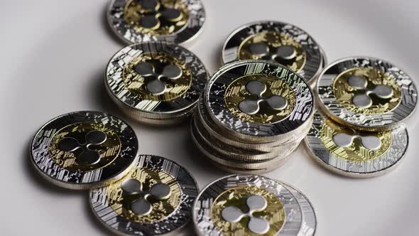 Rotating shot of Bitcoins (digital cryptocurrency) - BITCOIN RIPPLE 