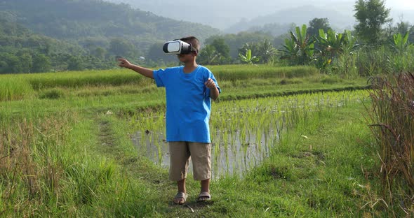 Rural Little Boy In Virtual Reality World