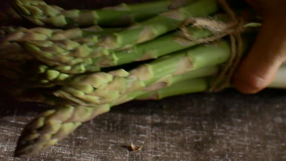 Bunch of Fresh Green Asparagus on Dark Wooden Table Healthy Eating Seasonal Products