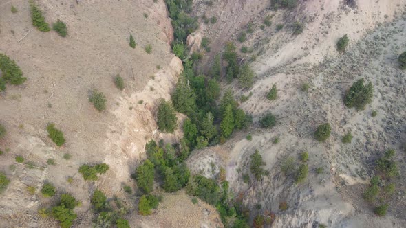 Deep and narrow valley between dry mountains of the Thompson-Nicola regional district in British Col