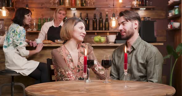 A Young Couple Having a Date in a Vintage Cafe