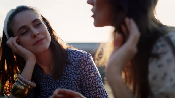 Video of two best friends sitting and talking in the sun. Shot with RED helium camera in 8K. 