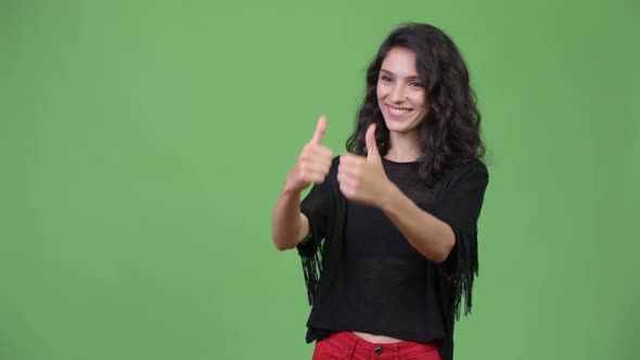 Young Beautiful Woman Giving Thumbs Up