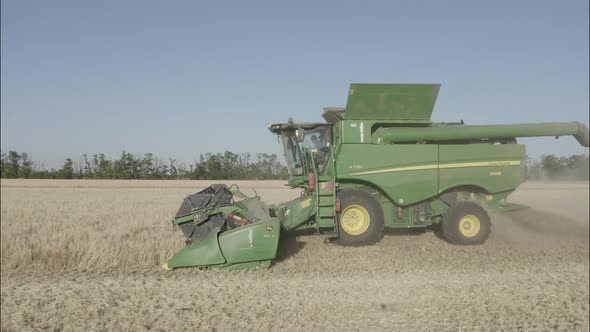 Combine Harvesting Wheat Top View of a Wheatfield