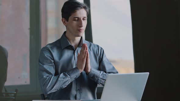 Portrait Caucasian Millennial Business Man Professional Sitting at Table Looking Into Laptop Screen