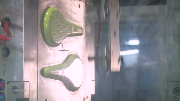 Automated production of plastic parts in a large factory