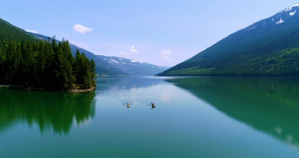 People kayaking in lake 