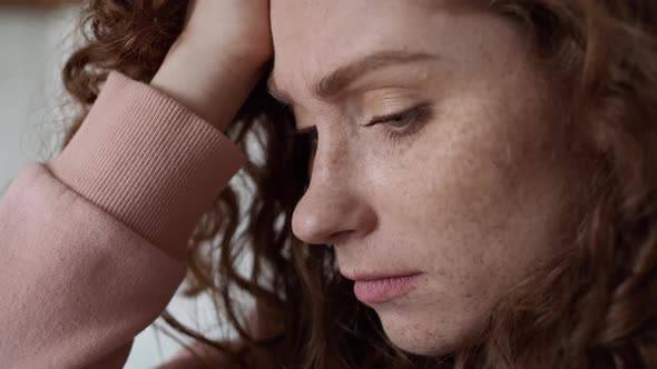 Close up of thoughtful young caucasian woman. Shot with RED helium camera in 8K.