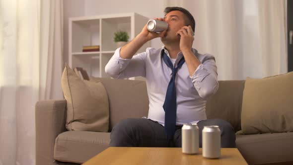 Man Drinking Alcohol and Calling on Smartphone 7