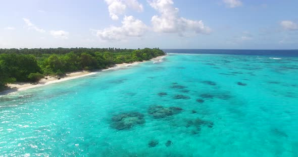 Tropical drone abstract shot of a summer white paradise sand beach and turquoise sea background in h