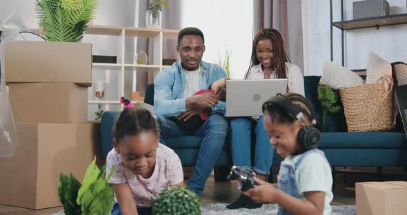 African American Family with three Small Kids Moved Into New Own dwelling 