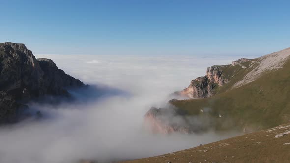 Aerial View of Fog in the Mountain Gorge