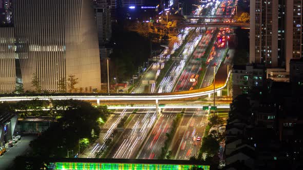 Shenzhen Urban Cityscape Aerial Road Traffic Panorama Timelapse at Night Pan Up