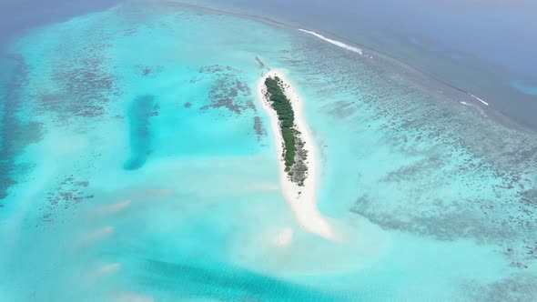 Sand Bank on Coral Reef Near Maldive Islands