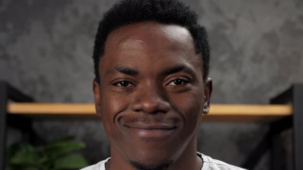 Close Up Smiling Face African American Man Looking Camera Standing in Office