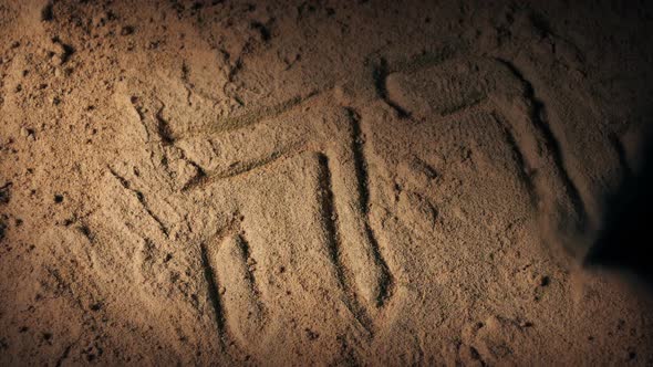 Ancient Hebrew Carving Revealed Under Sand