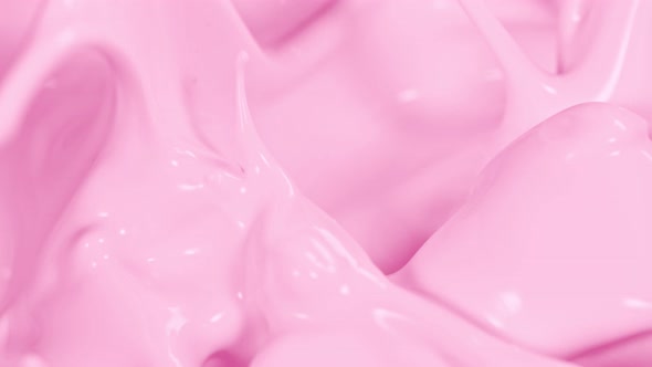 Super Slow Motion Shot of Pouring and Splashing Strawberry Milk at 1000Fps