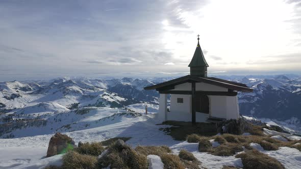 Panoramic view of mountains and a chapel