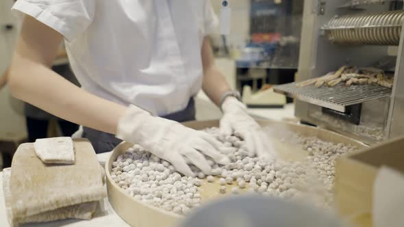 Female Worker In A Bubble Milk Tea Store Making Boba Pearls For Refreshing Drink