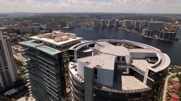 Aerial rooftop shots Porsche Design Tower and Turnberry Ocean Club Residences